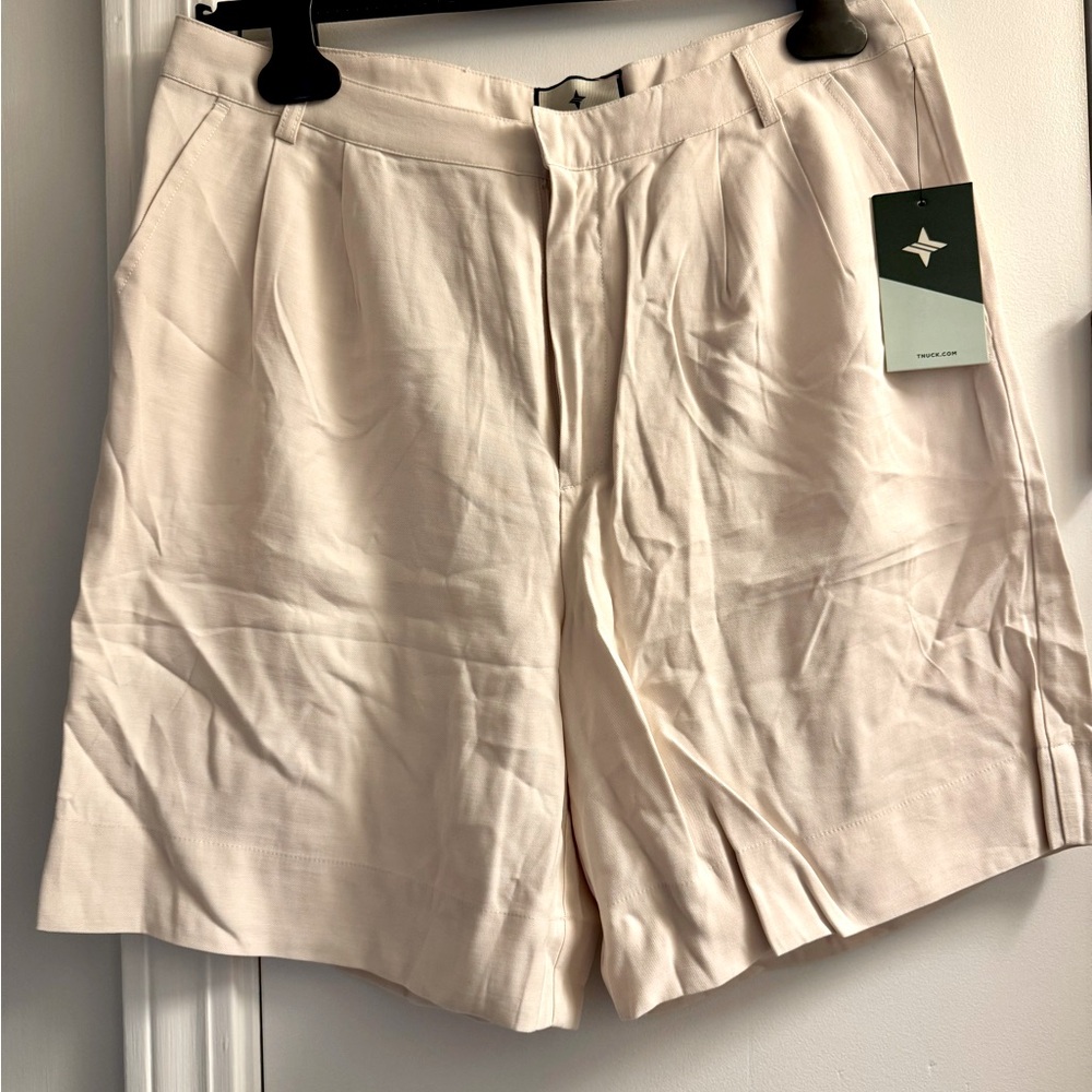 Tuckernuck Women's Pleated Shorts in Light Cream